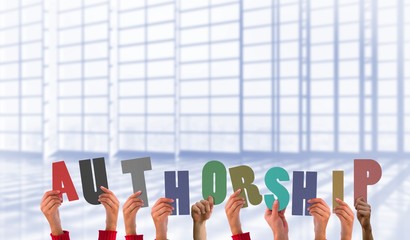 Composite image of hands holding up authorship