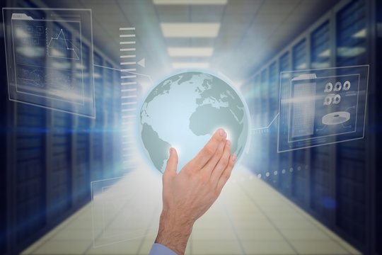 Composite image of businessman holding hand out in presentation