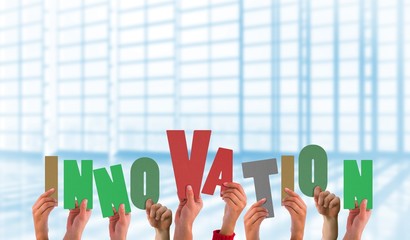 Composite image of hands holding up innovation