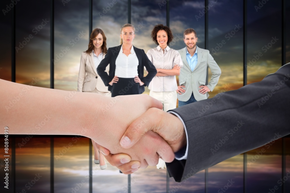 Poster composite image of close up of a handshake