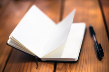 Notepad on a wooden table