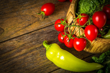 bunch of vegetables in the wooden bowl