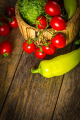 bunch of vegetables in the wooden bowl