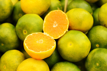 Green mandarin at fruit market
