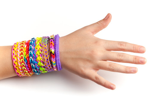 Child Hand With Colorful Rubber Rainbow Loom Bracelets