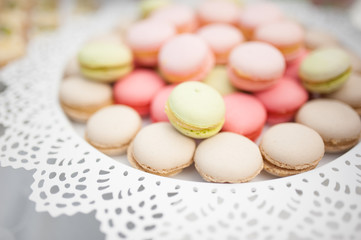 wedding dessert with delicious cakes and macaroons