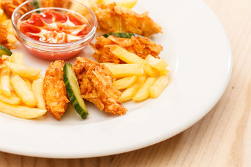 chicken nuggets with french fries