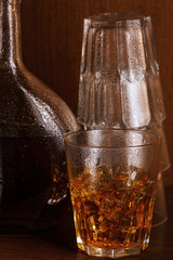 Bottle and glass with whisky