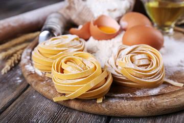Raw homemade pasta and ingredients for pasta