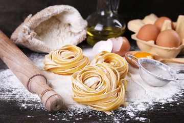 Raw homemade pasta and ingredients for pasta