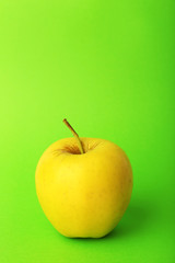 Apple on color background