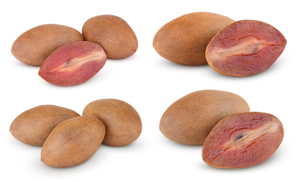 Fresh sapodilla plums with cut on white