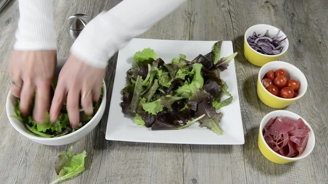 preparing salad plate