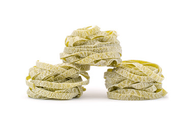 three roll pasta on a white background