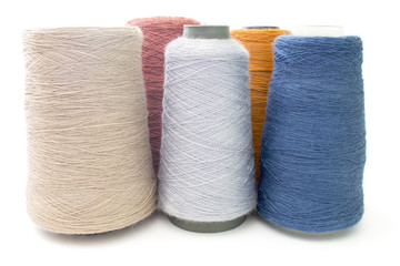 colorful background from threads and yarns isolated over white