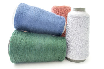 colorful background from threads and yarns isolated over white