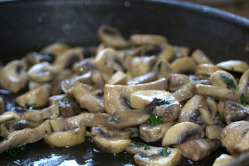 champignon mushrooms in pan