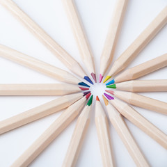 Colorful wooden pencils on white background
