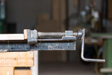 metal glue press for wood frame on fixed table