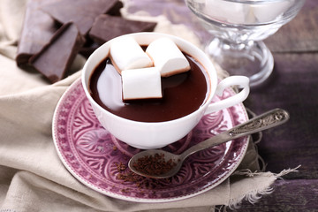 Hot chocolate with marshmallows in mug,