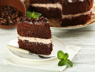 Delicious chocolate cake on table close-up
