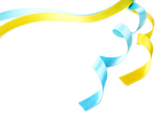 Colorful blue and yellow ribbons isolated on white