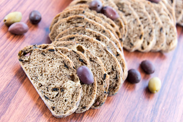 fresh baked olive bread slices