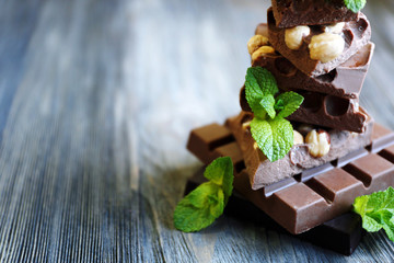 Set of spicy chocolate on wooden background