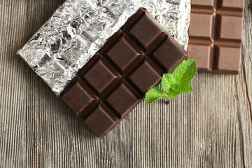 Set of spicy chocolate on wooden table, closeup