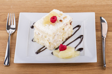 White Cake Slice on a White Plate