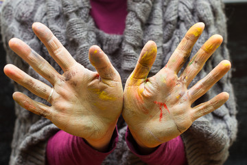 Hands stained with clay and paint. Hands painter and sculptor. C