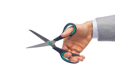 close up of businessman hand holding scissors