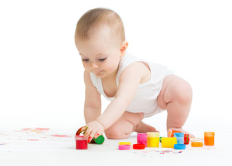 baby painting by hands
