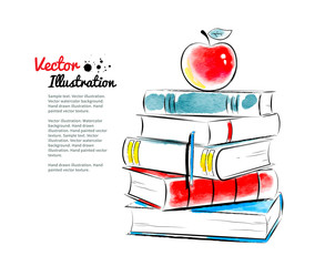 Red apple on books.