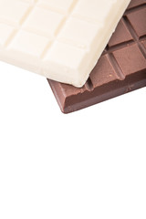 White and dark brown chocolate bars over white background