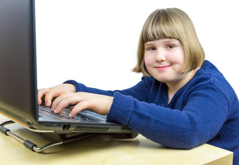 Young dutch girl working on laptop computer