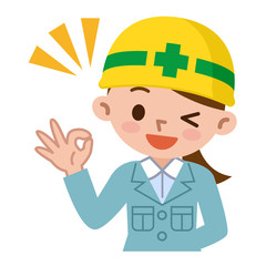 OKサインの若い女性　ヘルメット　作業着