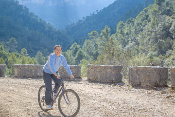 Fototapeta na wymiar Woman biking