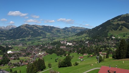 Fototapeta na wymiar Famous village and holiday resort Gstaad in summer