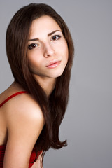 Naklejka premium portrait of beautiful brunette with brown eyes