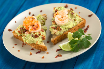 Toast bread with guacamole, fried shrimp, fried bacon
