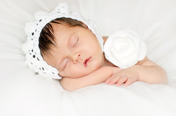 baby girl in a headdress