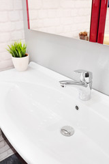 Closeup of a wash basin in a modern bathroom