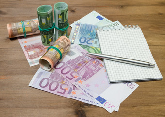 Euro Money, pen and notebook