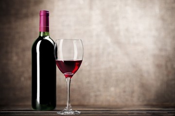 Fototapeta na wymiar Wine Bottle. Red wine bottle and glass, isolated on white