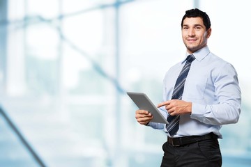30s. Businessman With Digital Tablet In Warehouse