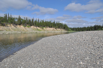 Pebble beach North of the river.