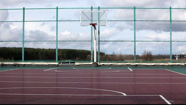 basketball hoop on sports court plastic floor 