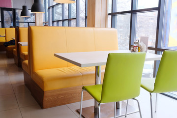 Modern restaurant interior with leather sofas