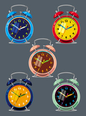 Set of a different colored alarm clocks